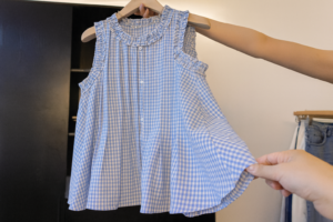 Why are striped lace outfits popular in Europe and America for children?